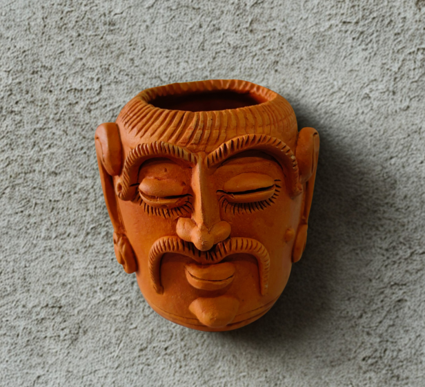 Terracotta mask pot