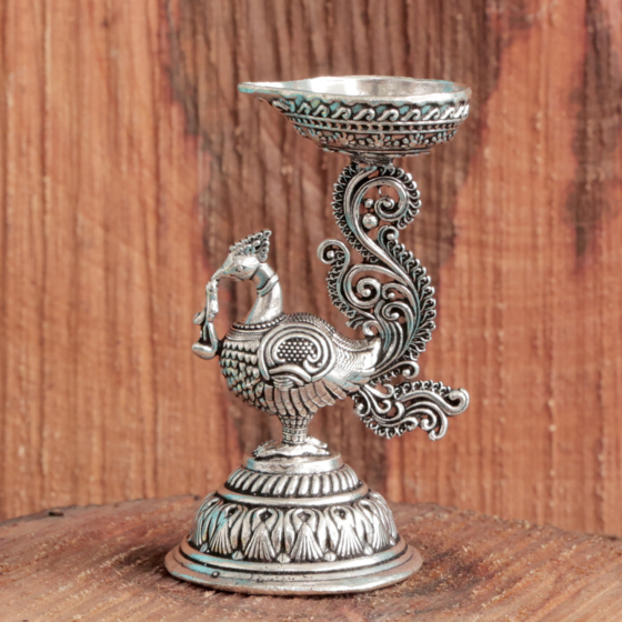 Silver Finish Peacock Diya for Home Temple, Aarti & Festival Decor BH12085