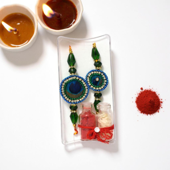 Exquisite Peacock Feather Bhaiyya Bhabhi Rakhi Combo with Roli Akshat