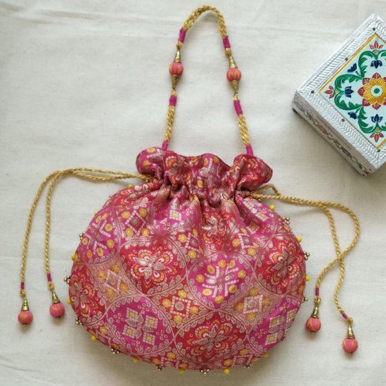 Handcrafted Peach Brocade Silk Potli Bag with Traditional Motifs