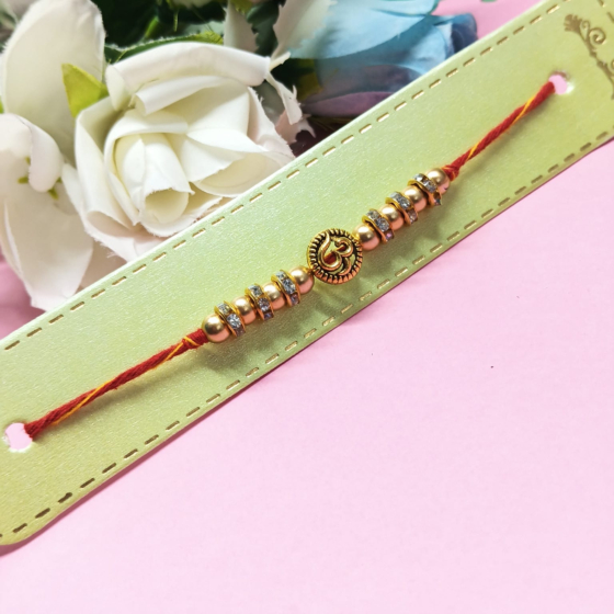 Golden Om Charm Rakhi 