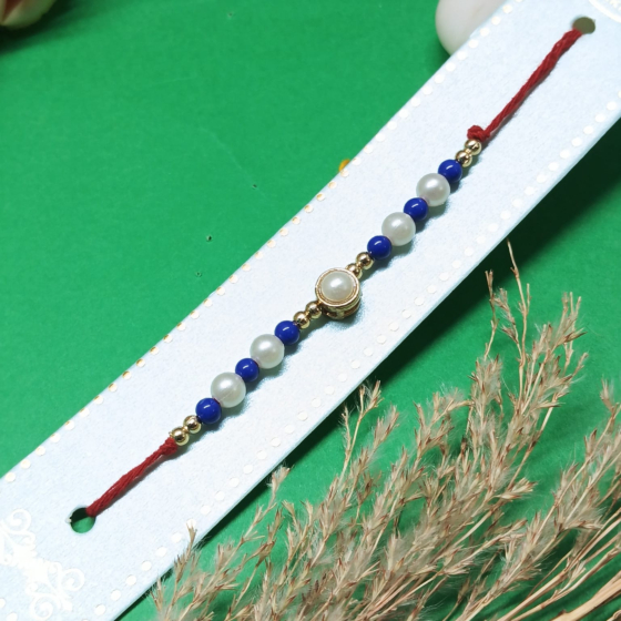 Elegant Blue & White Pearl Rakhi