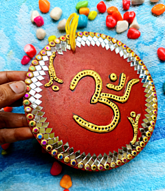 'OM' wall decor
