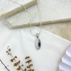 Handmade pendant with Shazar stone, showcasing cloud-shaped inclusions and mounted on a sleek silver chain.