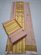 Pastel orange colour set mundu