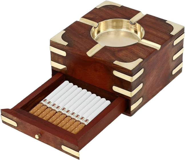 Ashtray with cigarette keeper