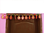The Enchanting Pink Ring Toran with Multi Pompoms and Golden Flowers for Diwali Decoration