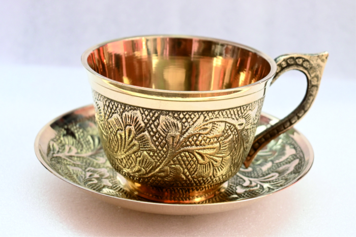 Brass tea cup set