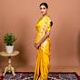 Pichhwai Handwoven Banarasi Silk Saree in Radiant Yellow
