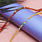 Handcrafted Wool & Bead Rakhi Set