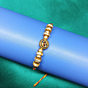 Golden Om Charm Rakhi 