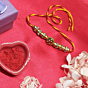 Golden Om Charm Rakhi 