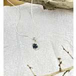 Serene River pendant by Ochrello showcasing an oval Shazar stone with blue and black dendritic inclusions set in elegant sterling silver.