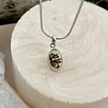 Zoomed view of the Shazar stone’s intricate tree-like patterns within the polished silver frame, showcasing natural artistry.